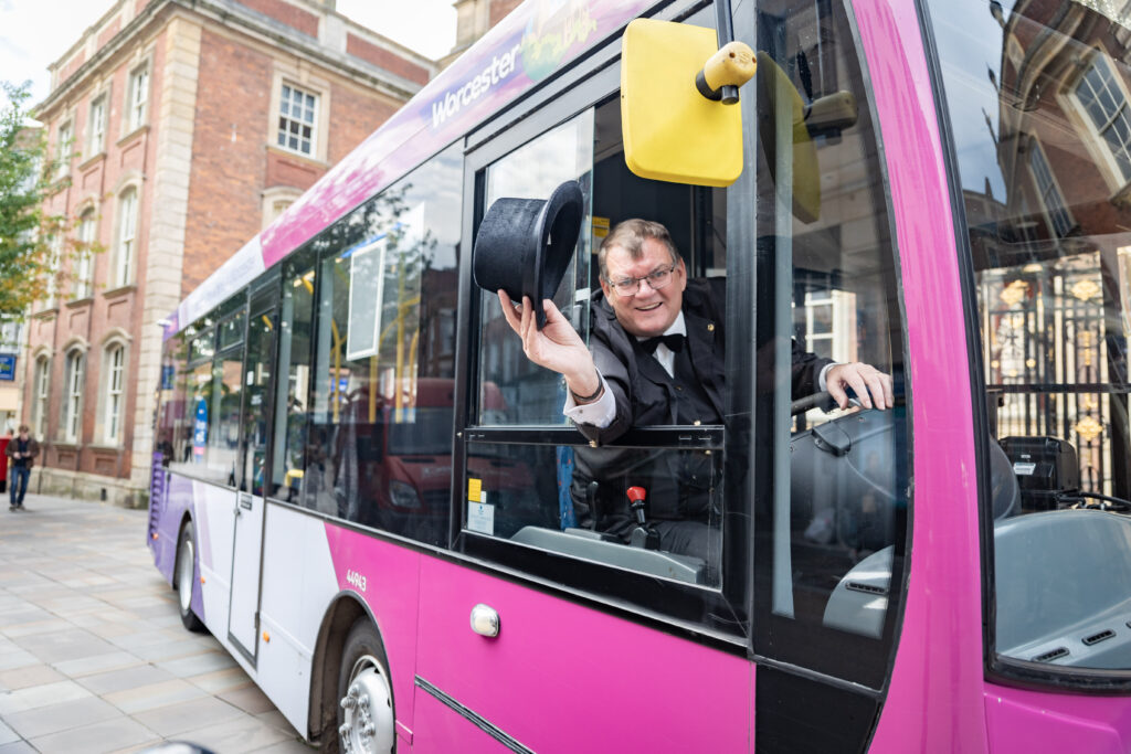 R6__1675-06Oct2023 A bus driver waving