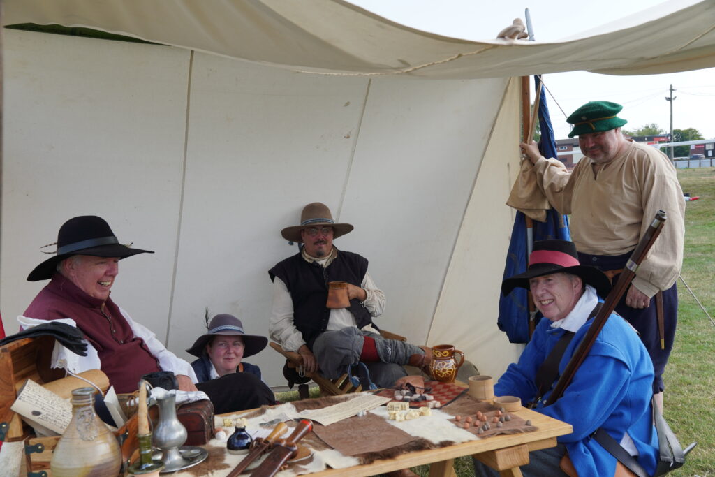 Worcester Re-Enactors sat in different outfts